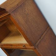 German oak bookcase with folding doors, ca 1900
