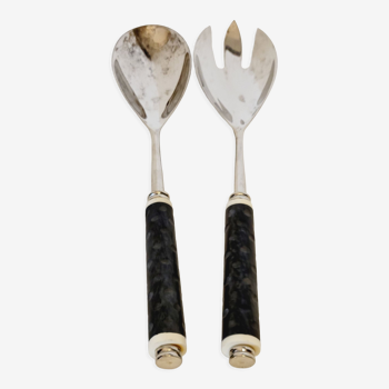 Set of salad serving cutlery in silver metal and resin