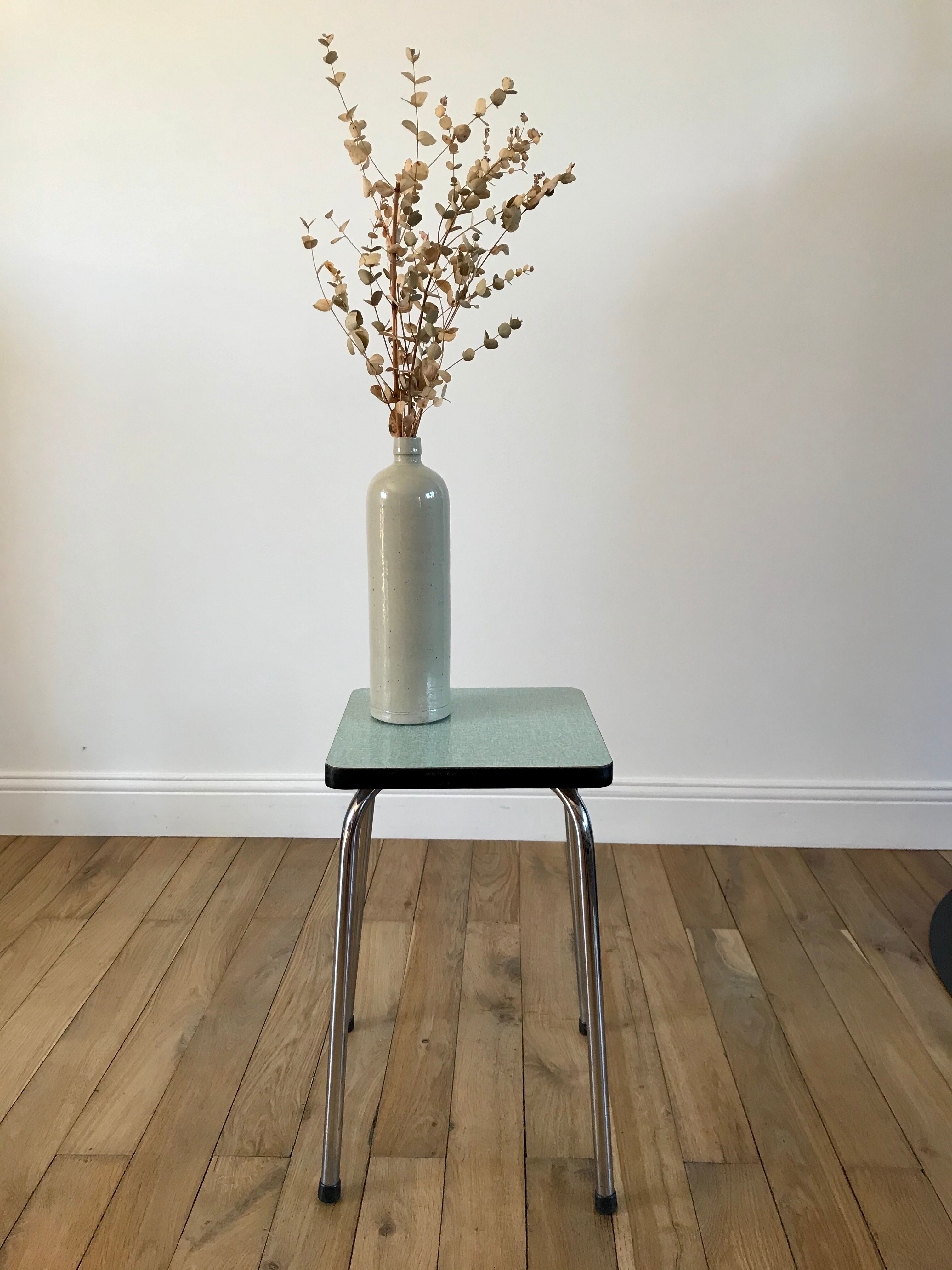 Green stool in formica 70s