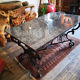 Table art déco fer forgé et granit Gilbert Poillerat 1930