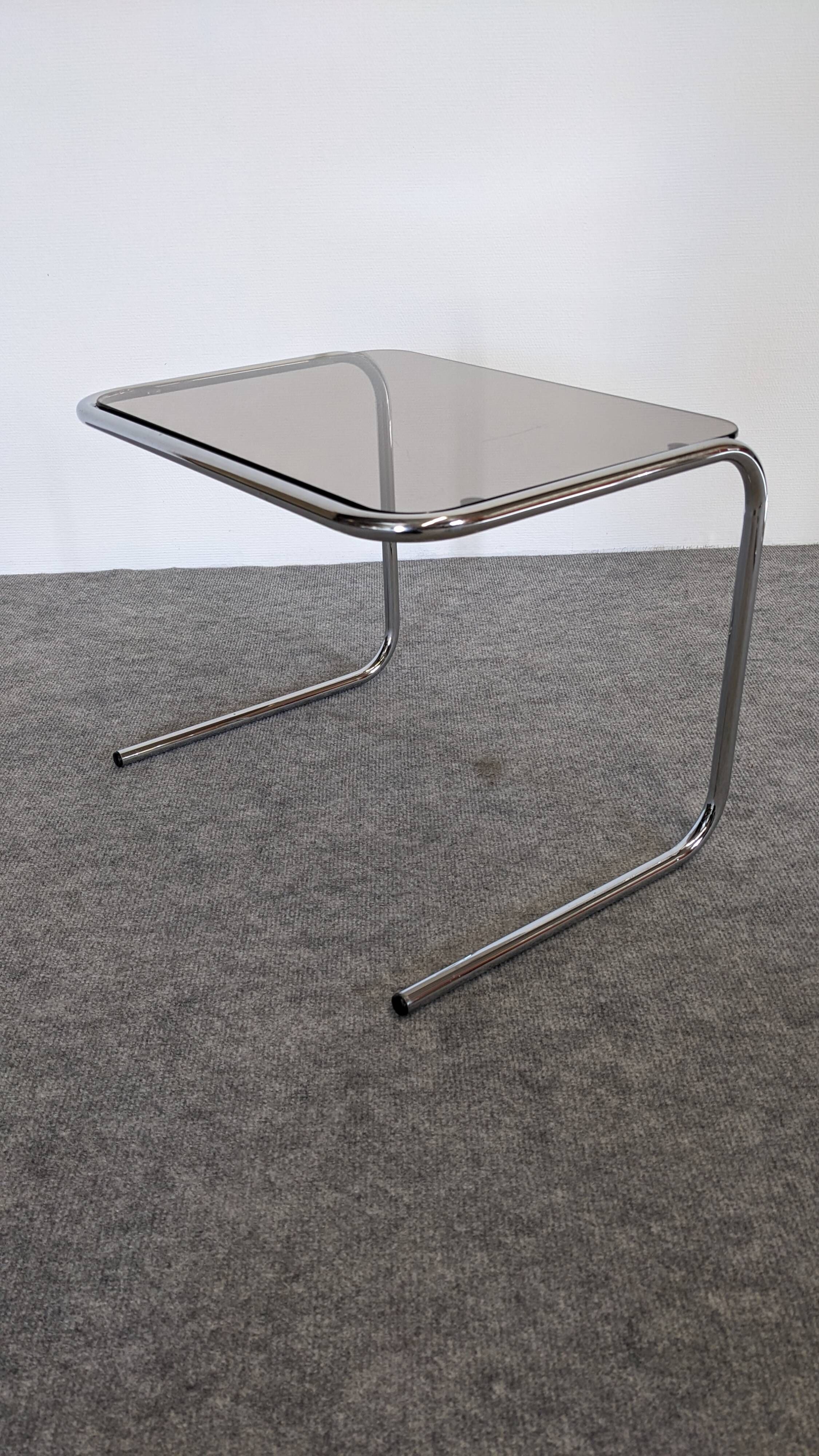 Nested tables with tubular chrome and smoked glass, France 1970.