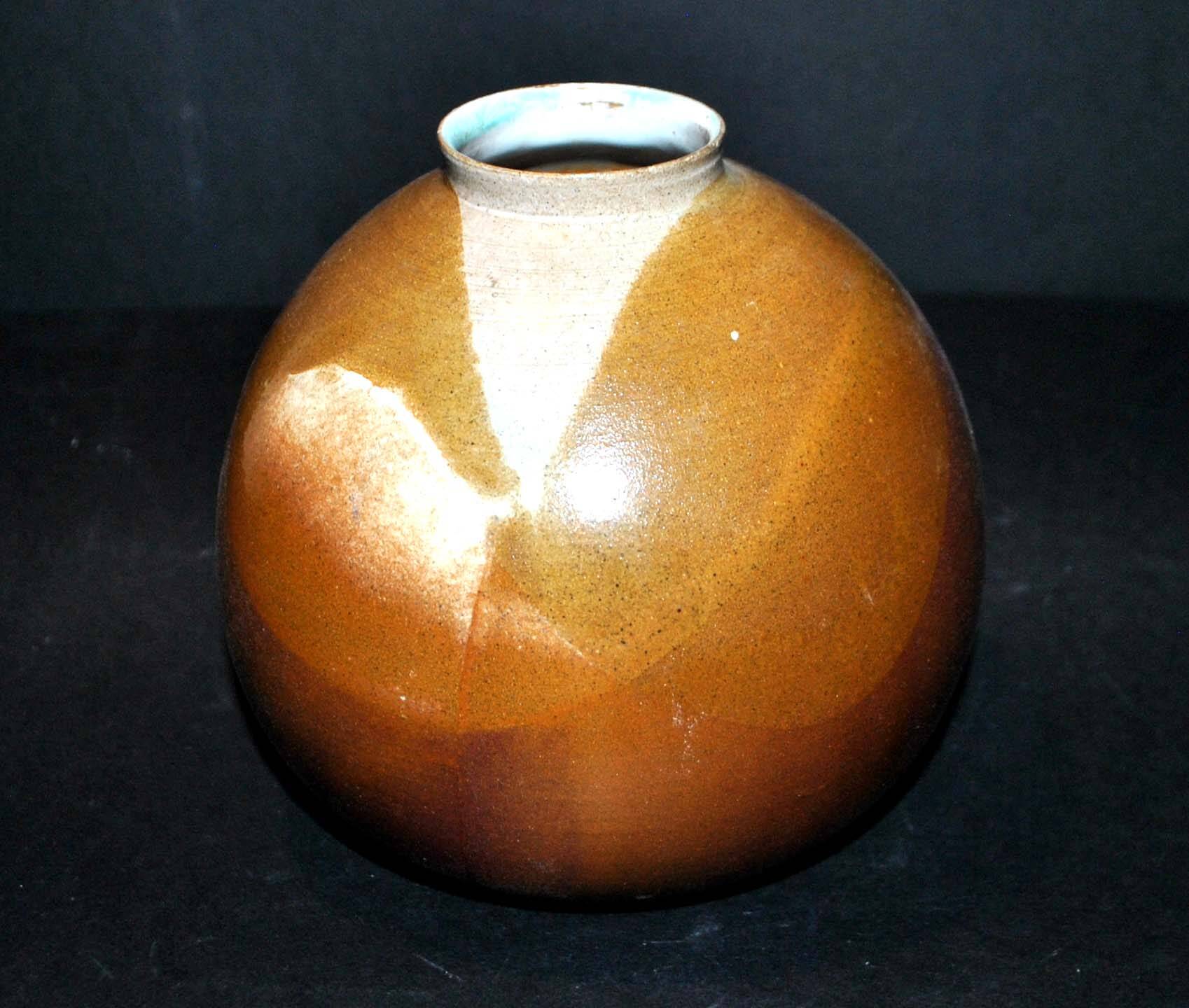 Vintage ball vase in flamed stoneware 1960 - caramel color with blue flow - signed DS