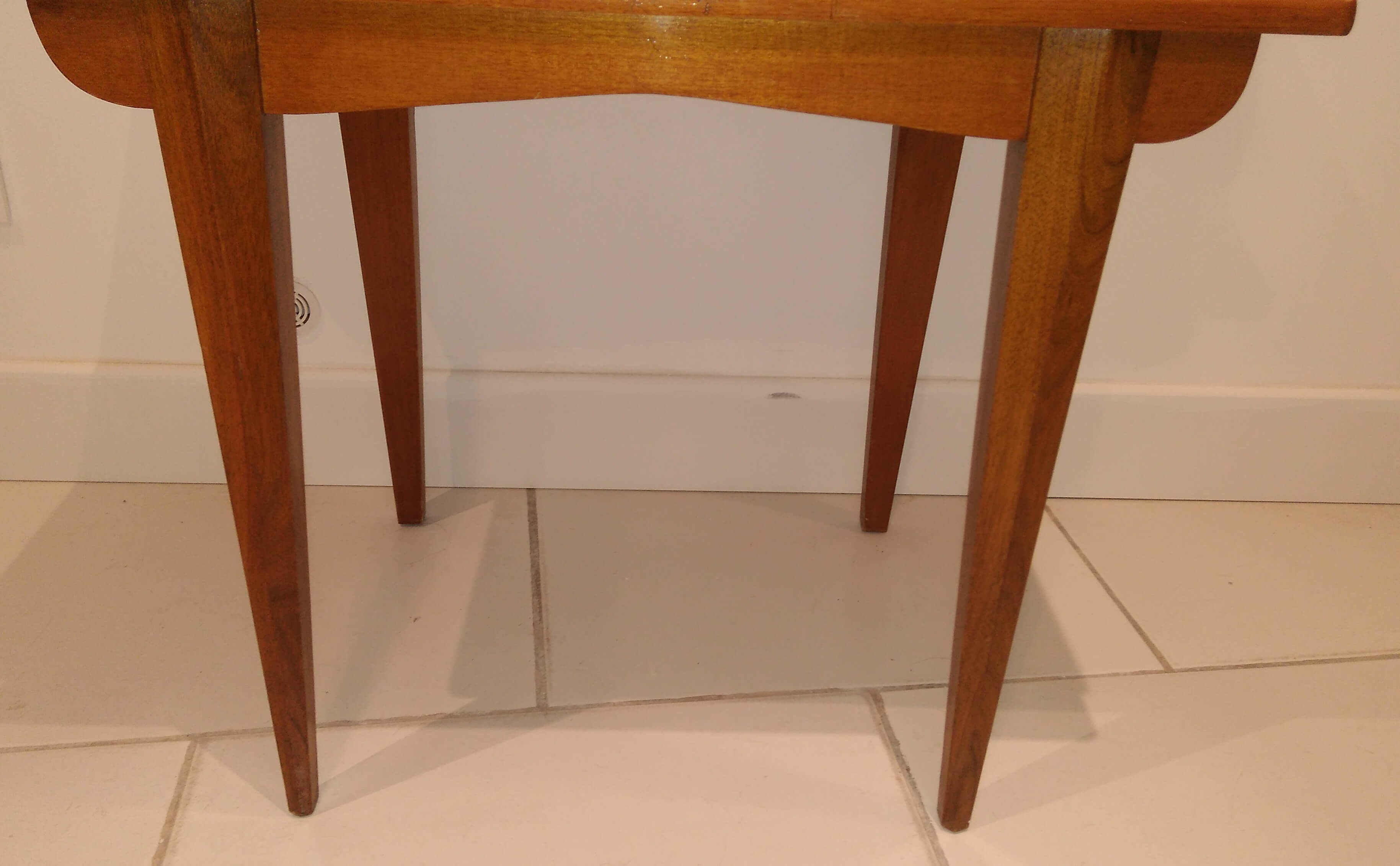 Vintage bedside table with compass feet