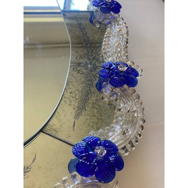 Early 21st century venetian oval floreal hand-carving mirror in murano glass