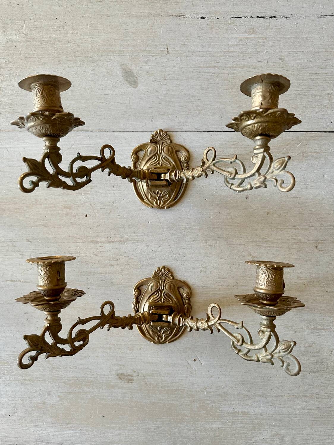 Pair of brass wall candle holders