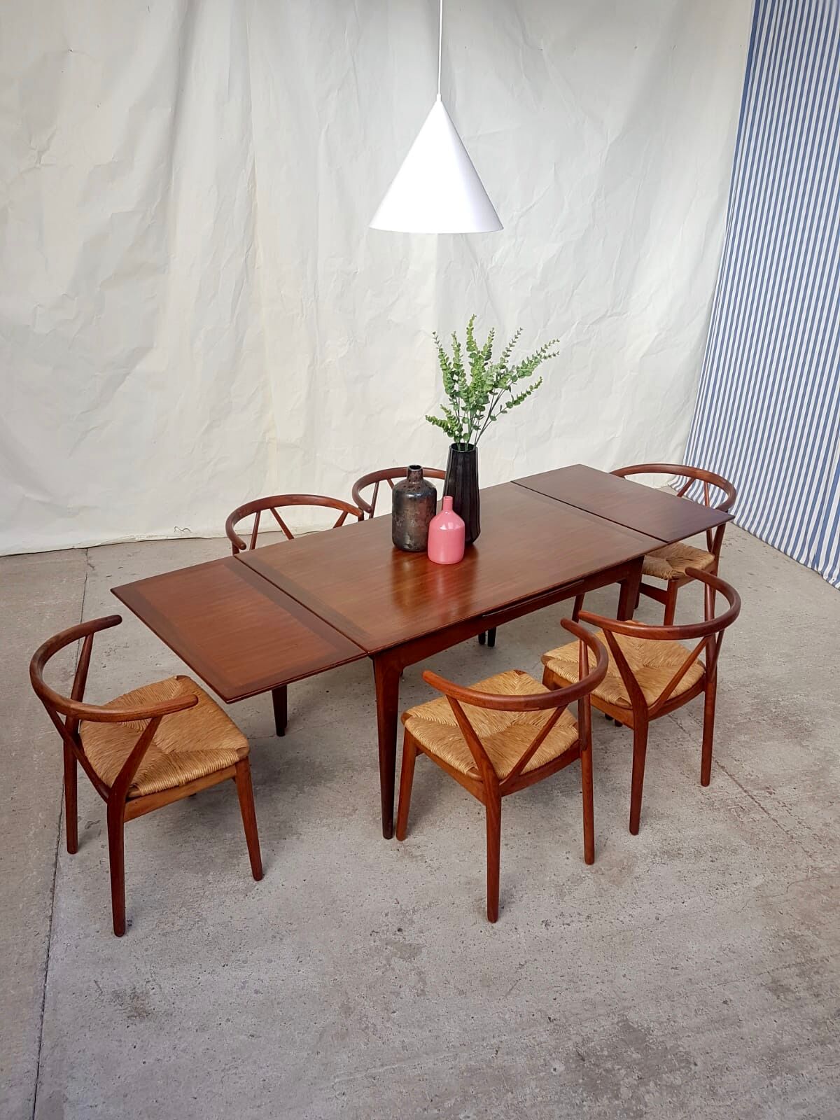 Teak extending dining table by Younger
