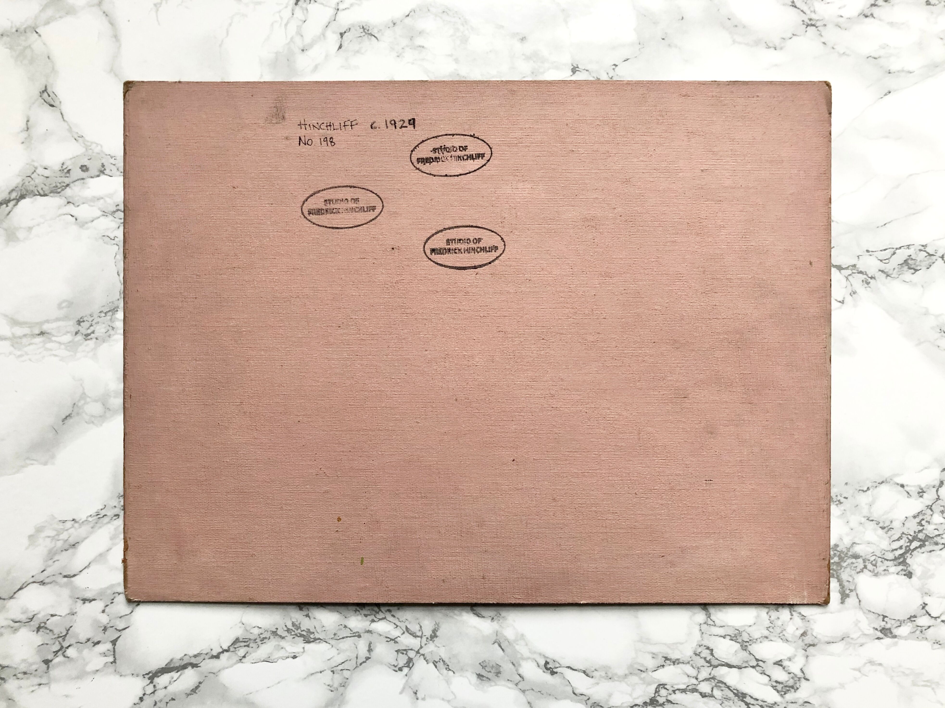 Oil on old cardboard depicting a hilly country landscape