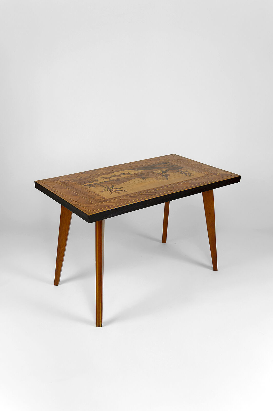 African Midcentury coffee table in inlaid wood, circa 1960