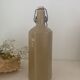 Old enameled stoneware bottle