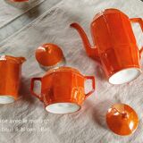 Iridescent orange porcelain coffee set from the 50s-60s with black edging