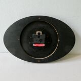 Ffr morbier clock from the 50s, in two-tone formica