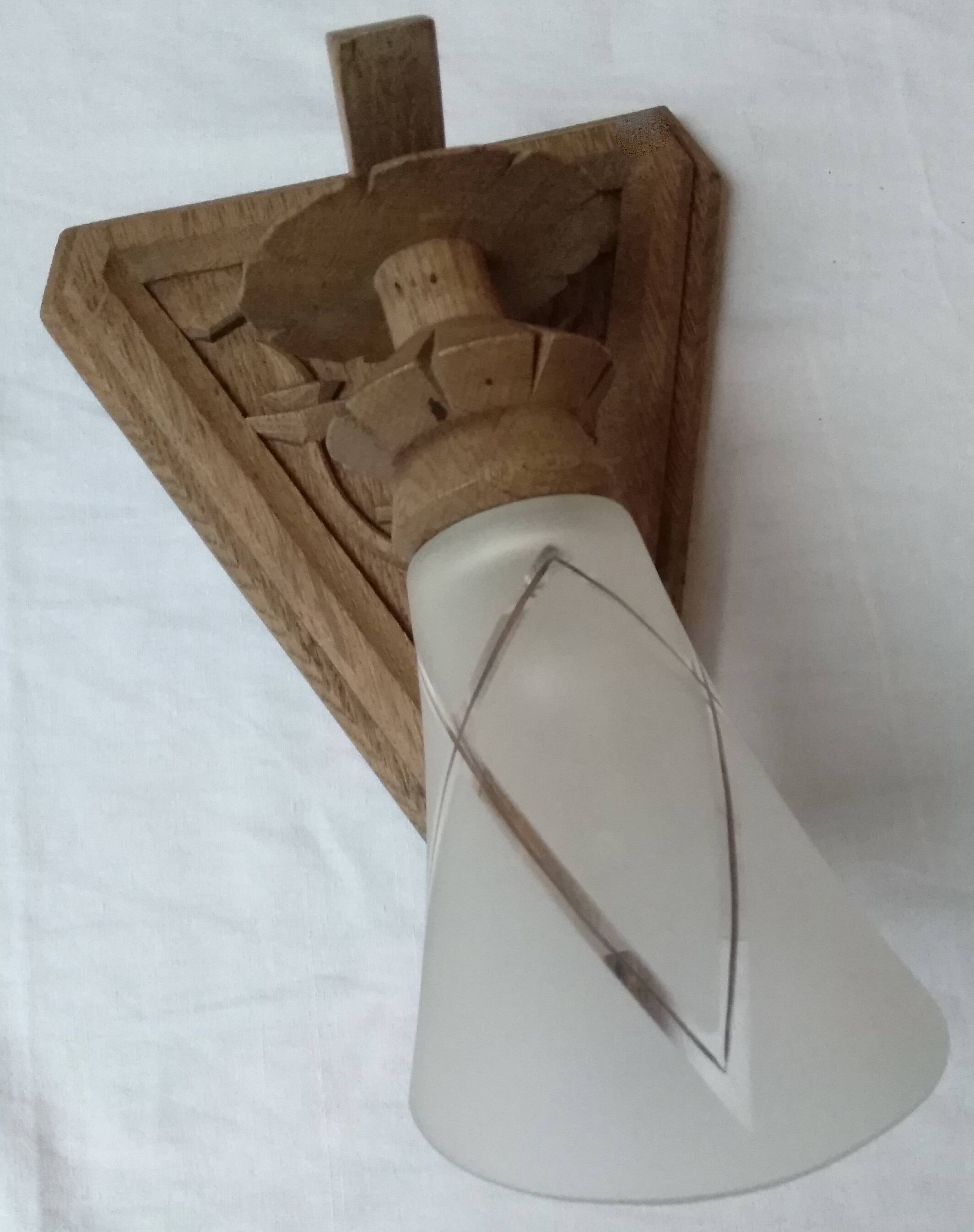 Old hand-carved wooden wall light