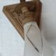 Old hand-carved wooden wall light