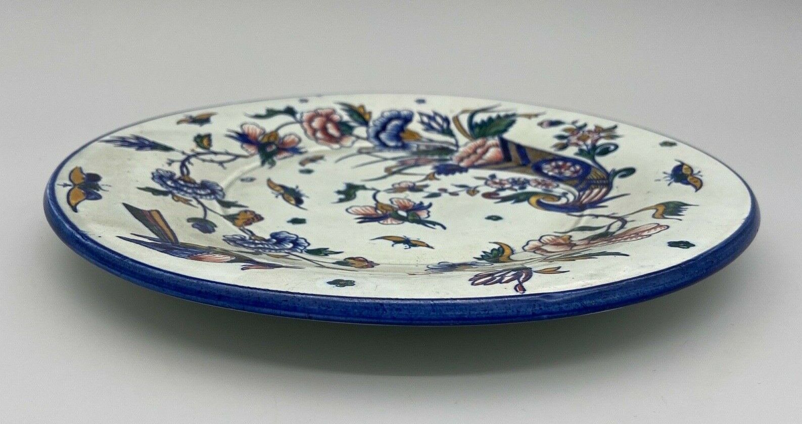 Plate gien with cornucopia decoration insect peacock butterfly