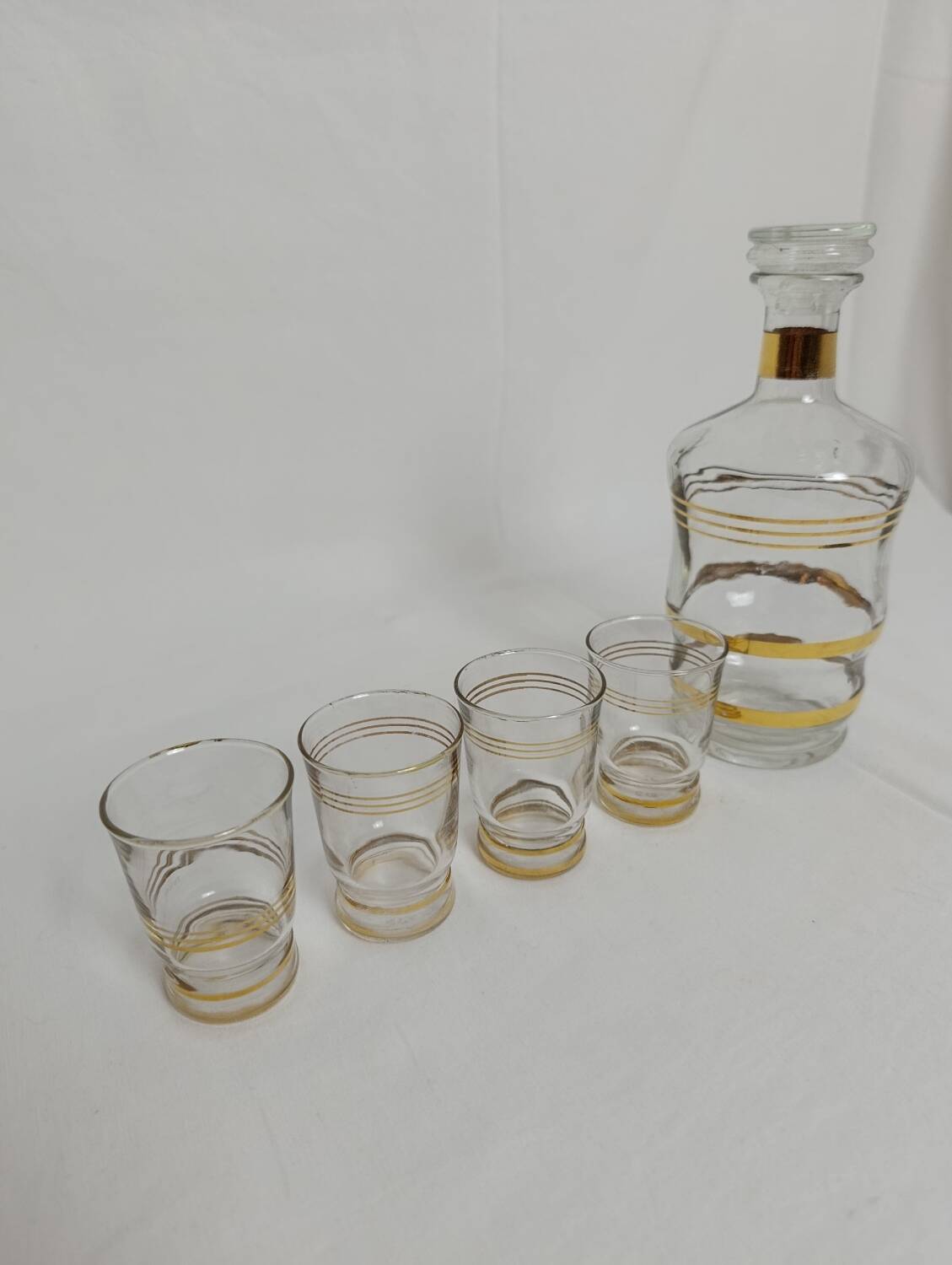 Liqueur carafe and its 4 small glasses