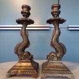 Pair of bronze dolphin candlesticks