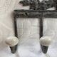 Patinated metal wall bracket and porcelain