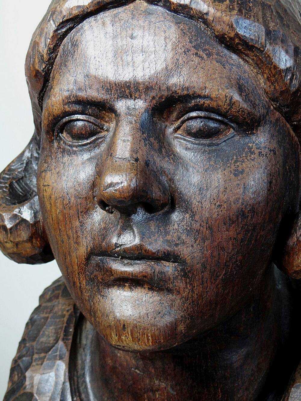 bust of a woman in solid wood carved with a gouge, 19th century