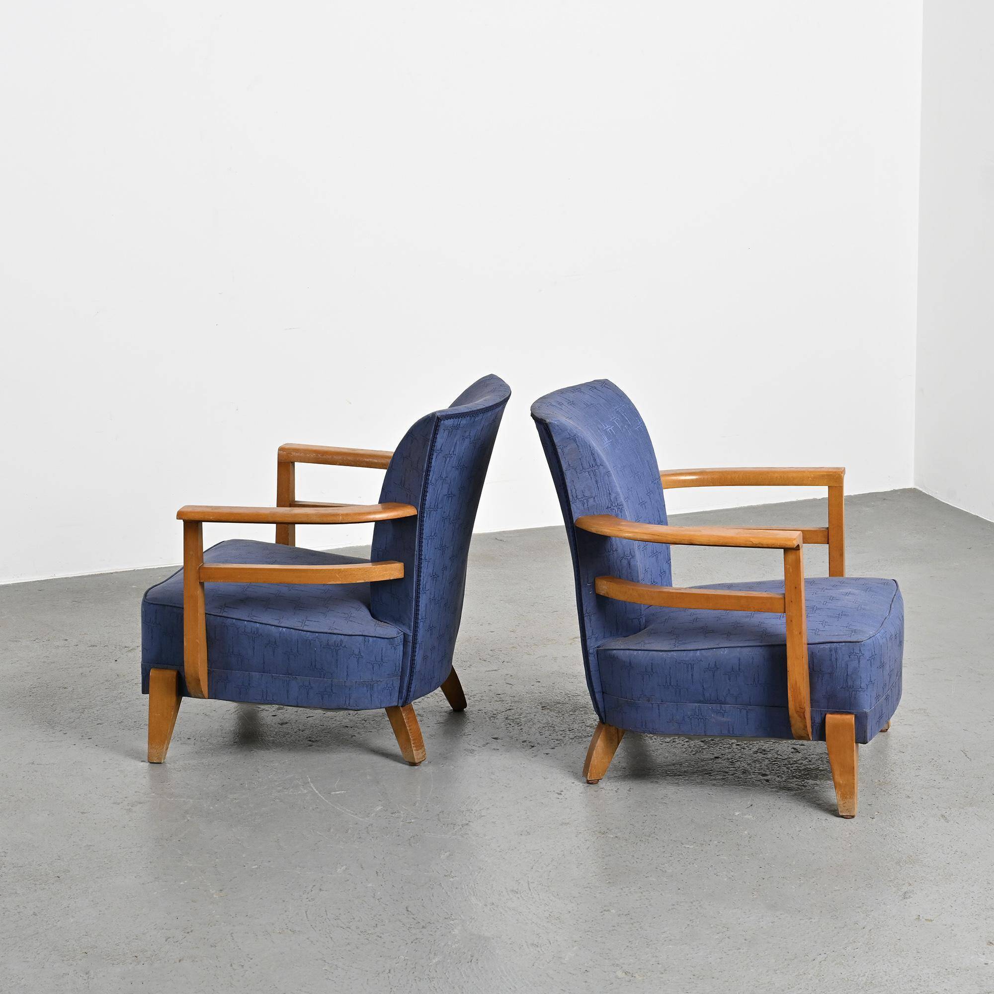 Pair of living room armchairs in solid beech, France, circa 1950.