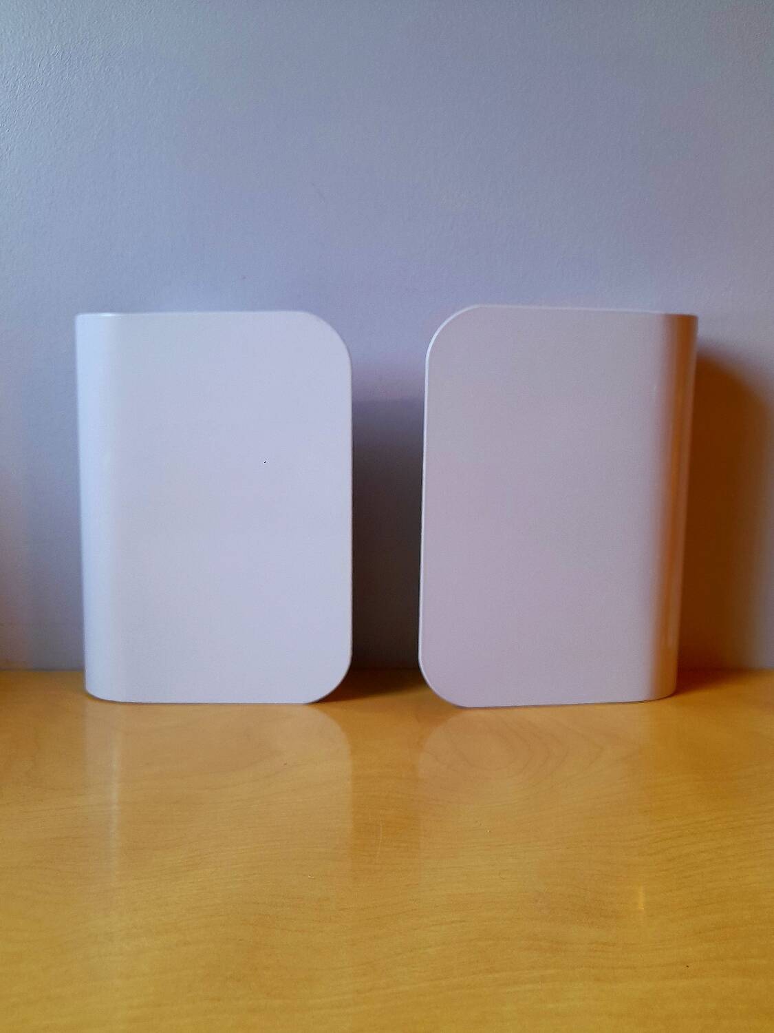 White lacquered metal wall sconces