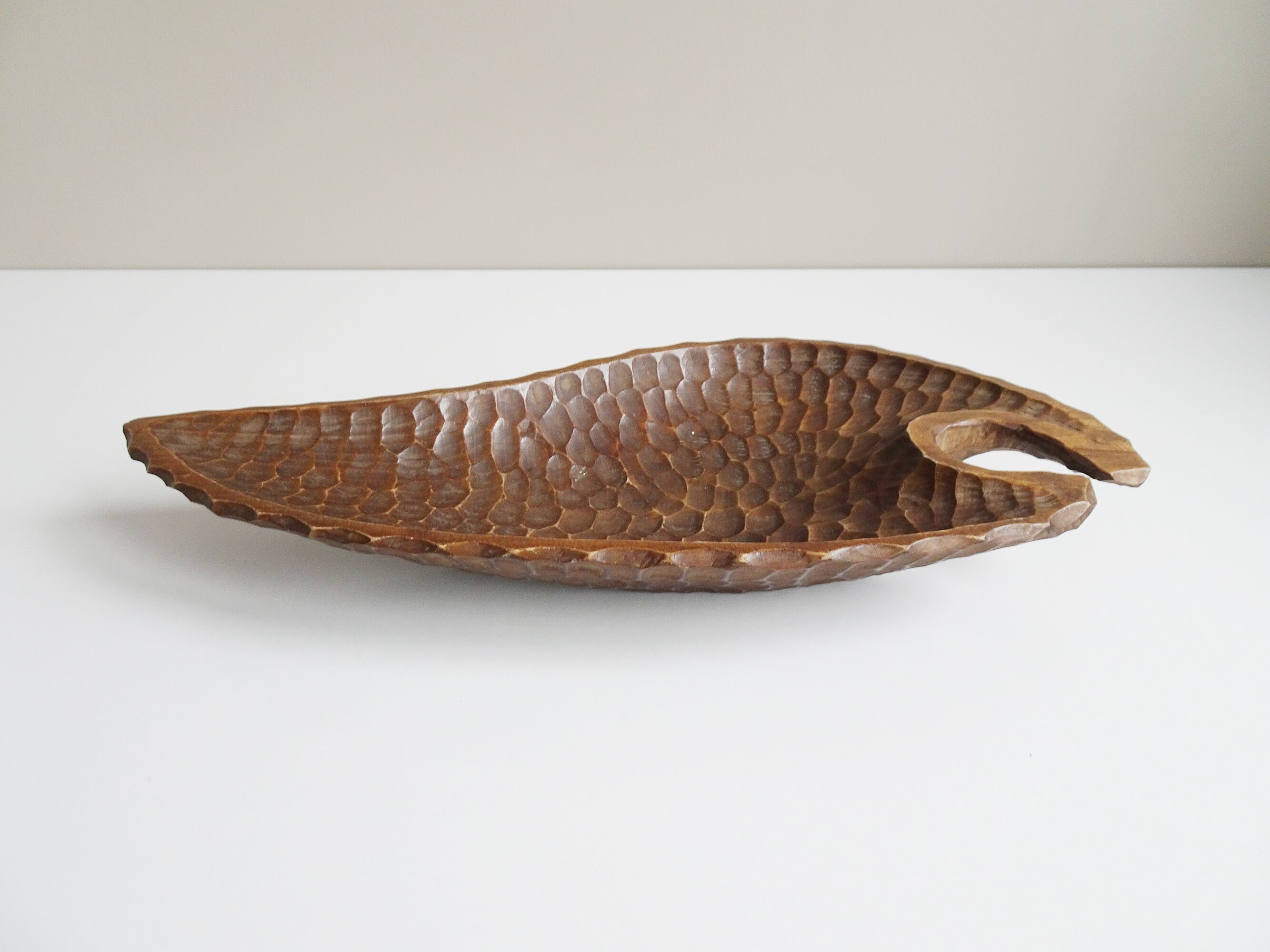 Antique hand-carved wooden bowl