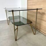 1975 glass coffee table with 2 tops, good condition
