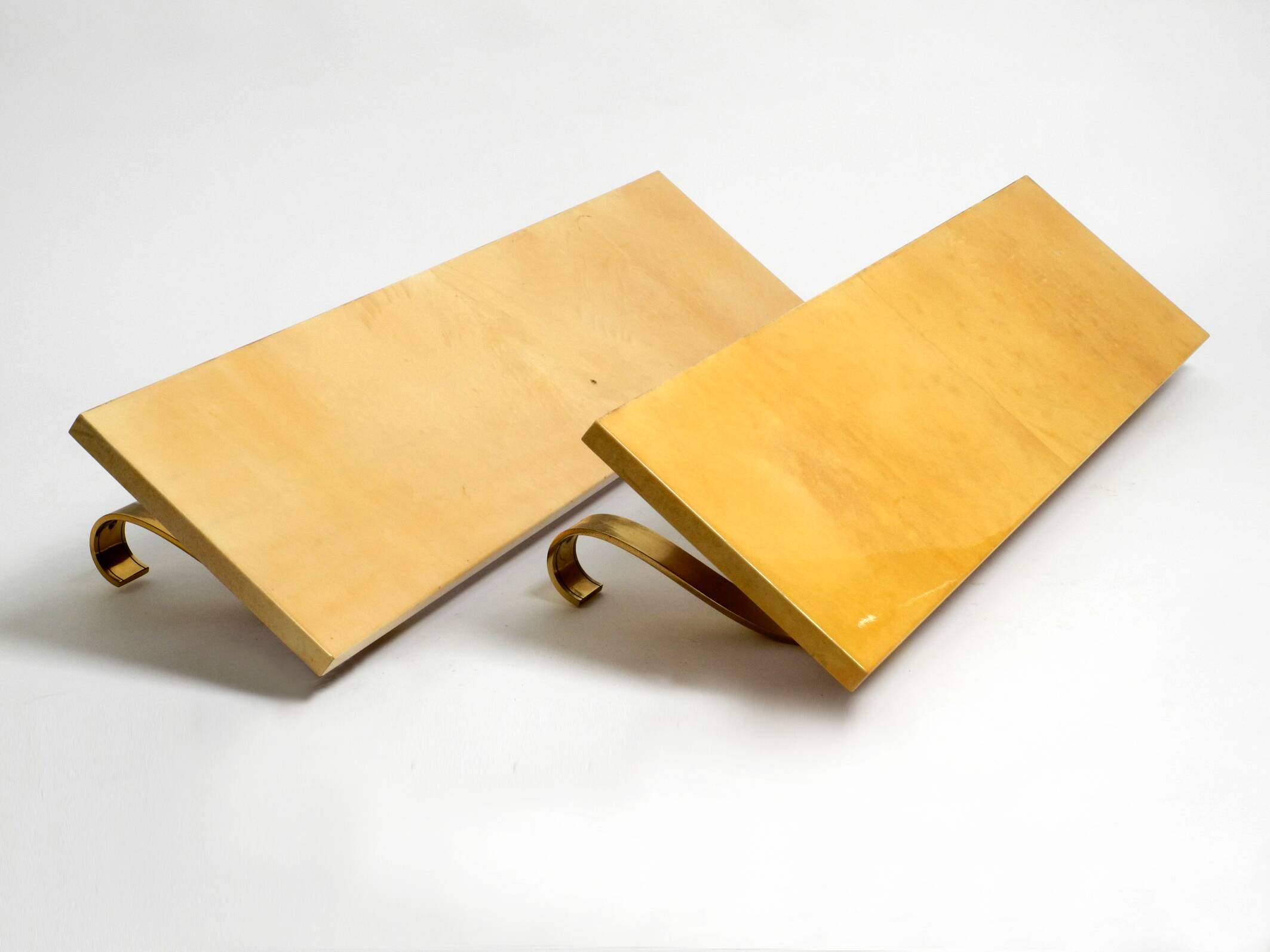 Two 1960s large Aldo Tura shelves made of wood and goatskin in beige