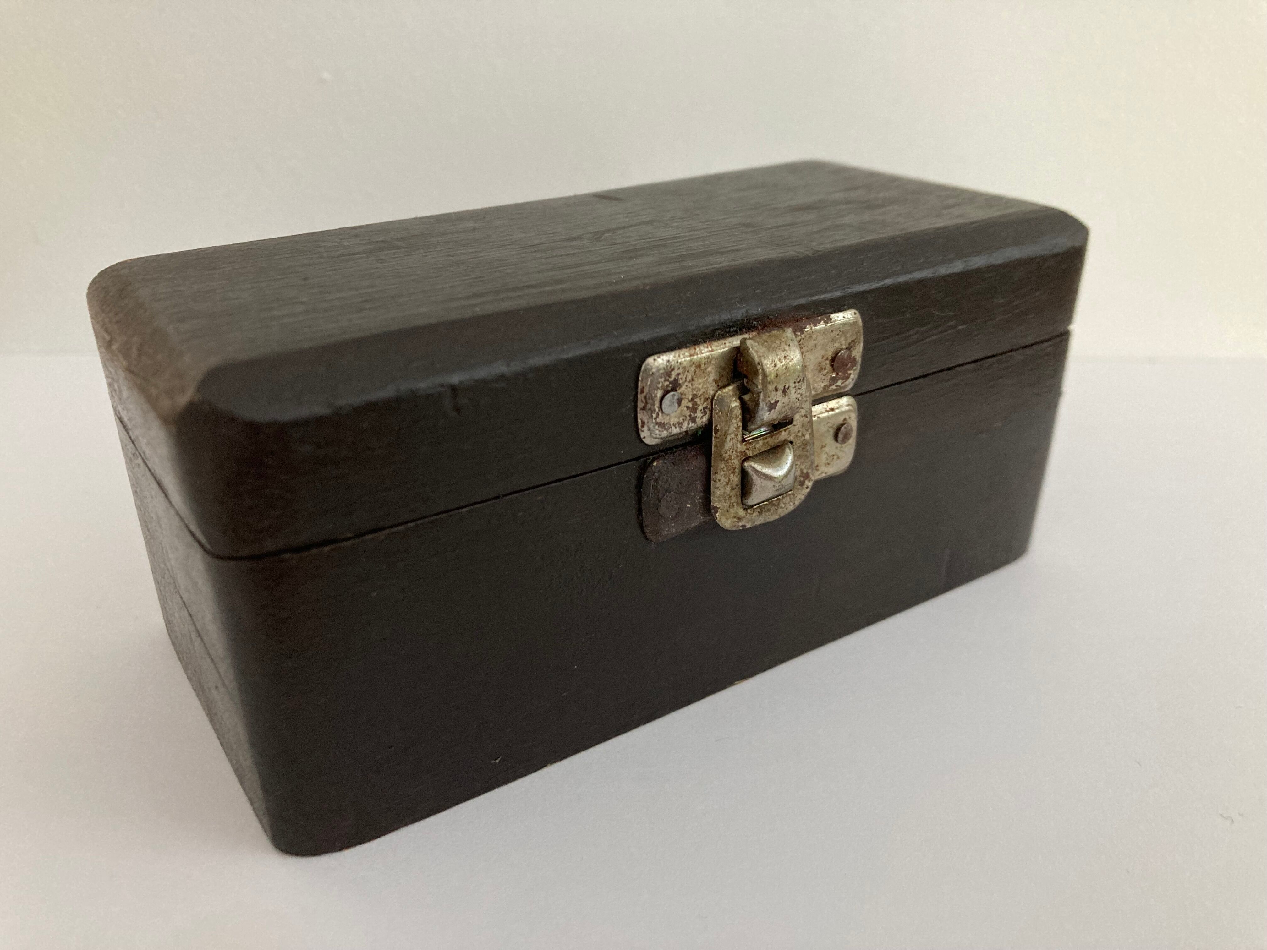 Balance weight in their wooden box