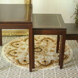Pull-out tables in mahogany and vintage brass