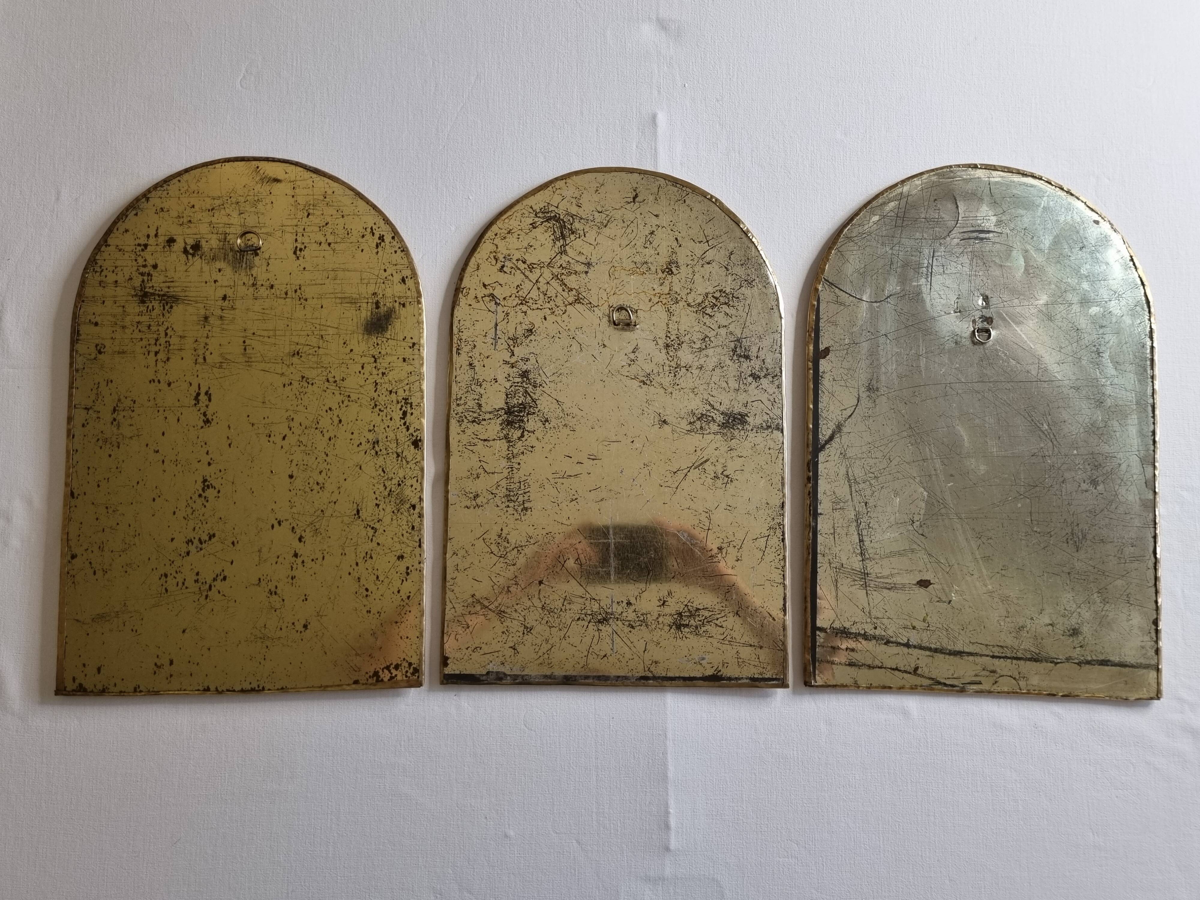 Set of three Moroccan brass mirrors in the form of arches, 43 cm