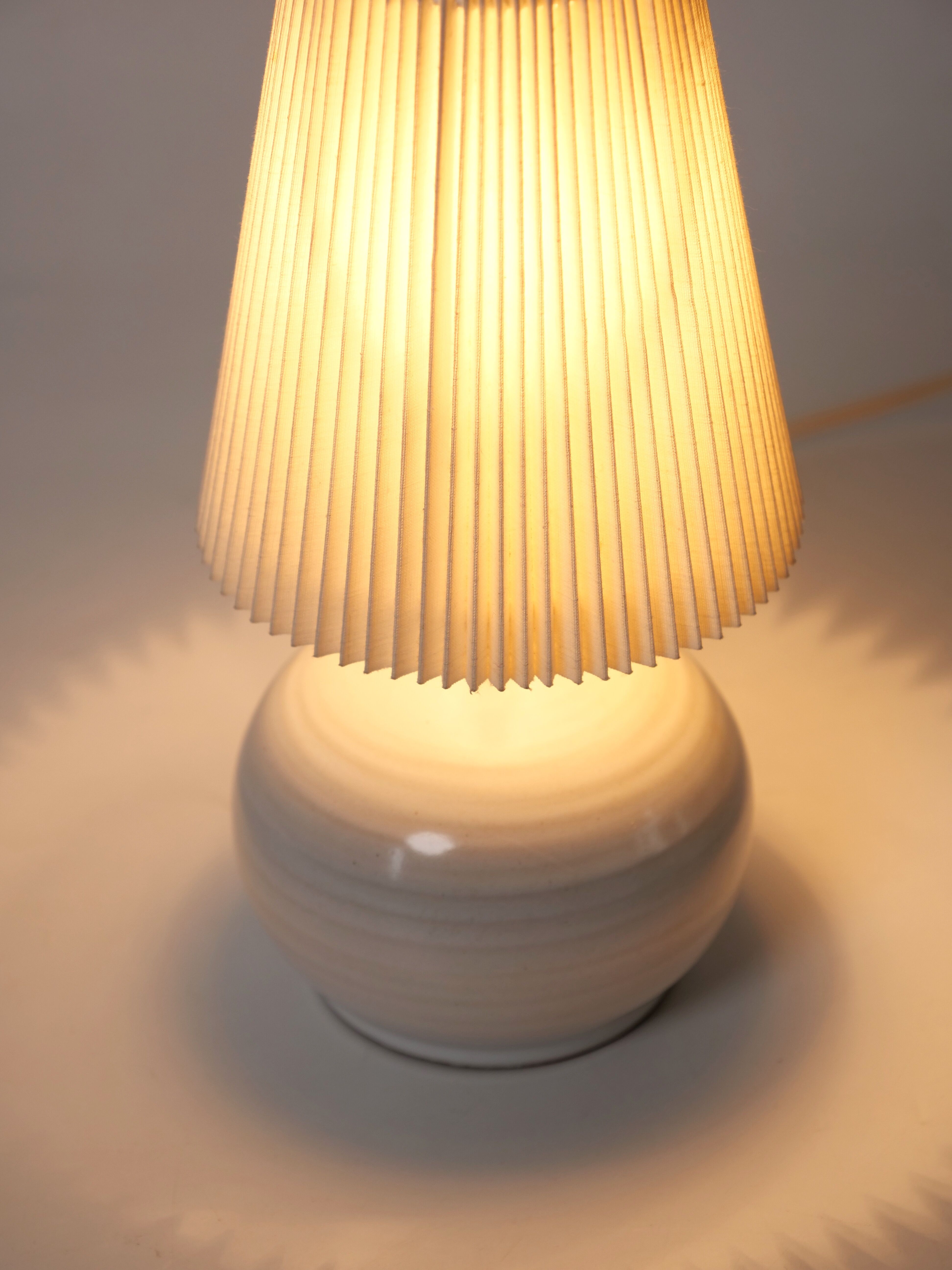 Terracotta lamp signed