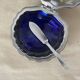 Stainless steel and glass shell butter dish with knife