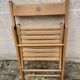 Chaise pliante en bois couleur miel
