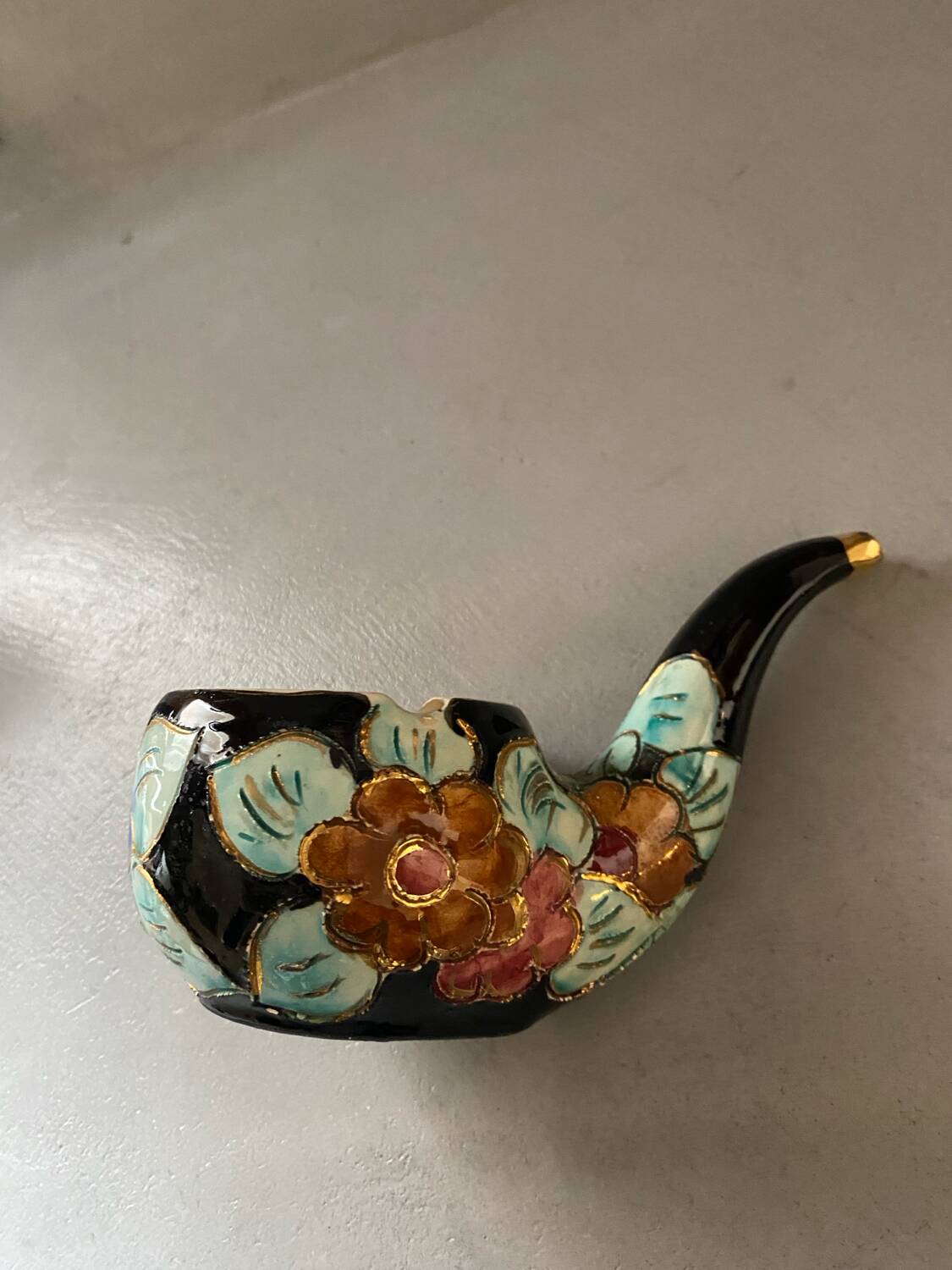 Vallauris pipe-shaped ashtray with blue and gold flowers