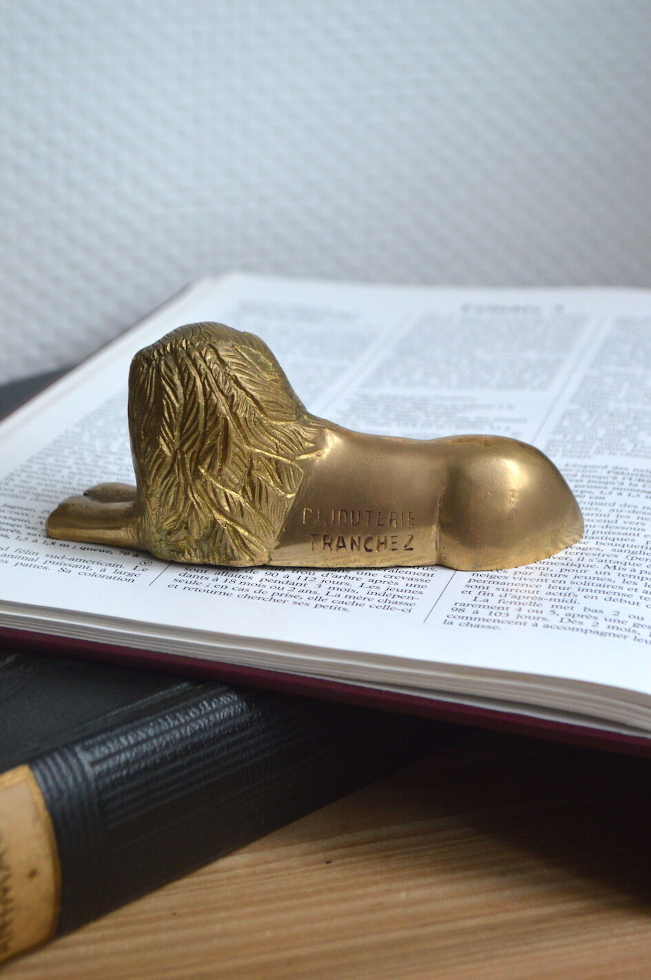 Brass lion paperweight