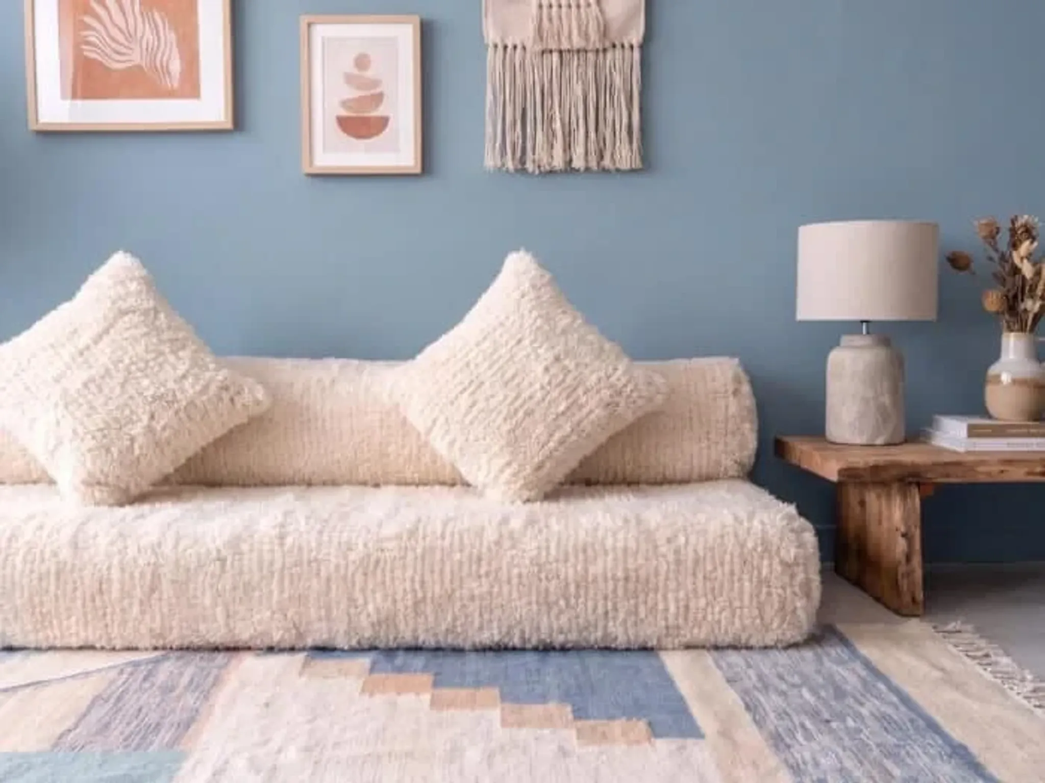 White Moroccan Arabic sofa with a rounded backrest.