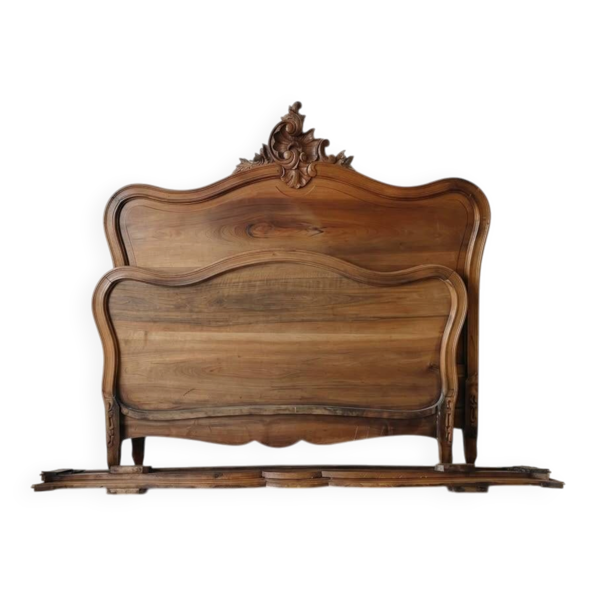 Antique double bed in carved solid wood in Louis XV style.
