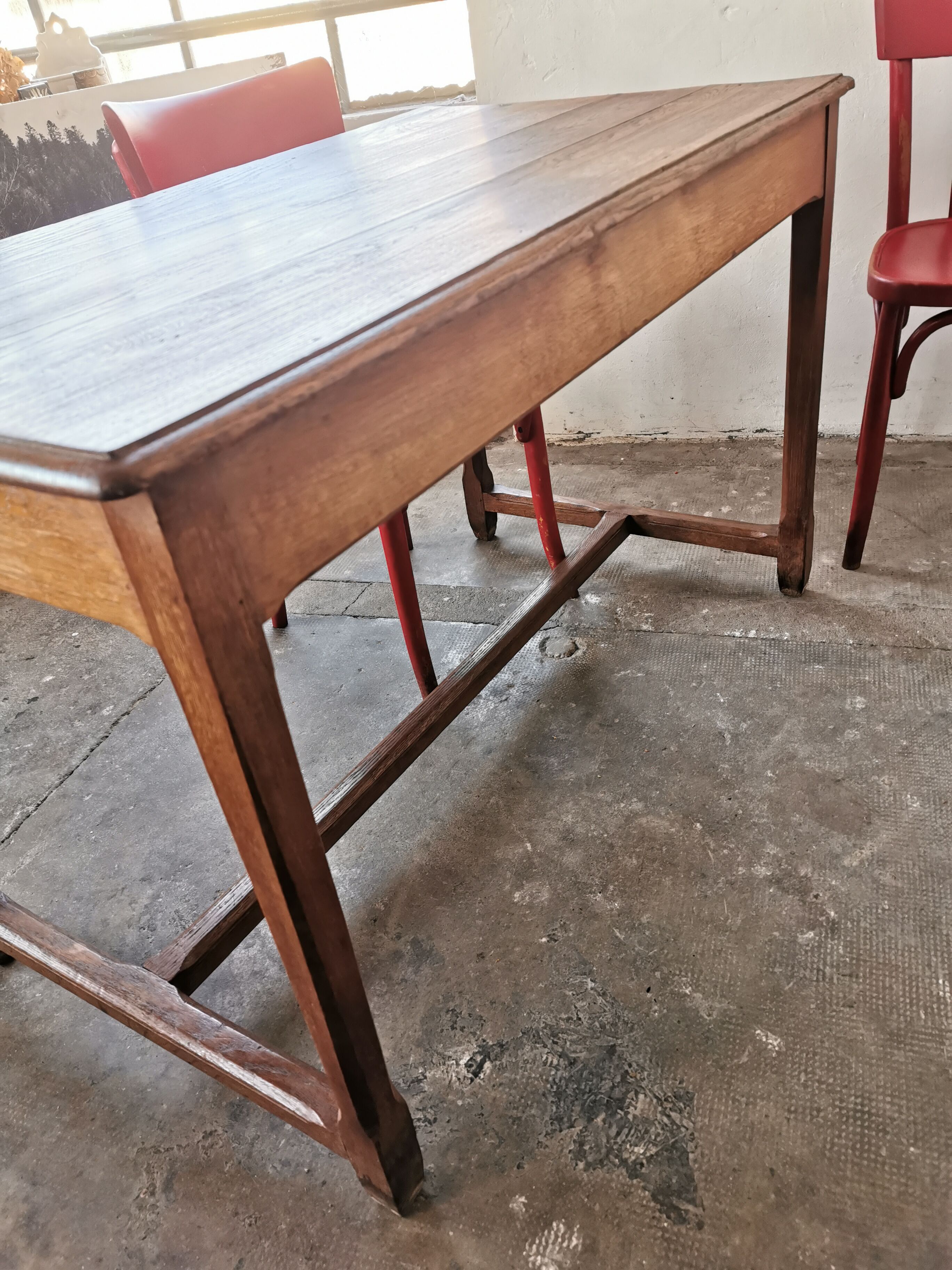 Table in raw oak, countryside.