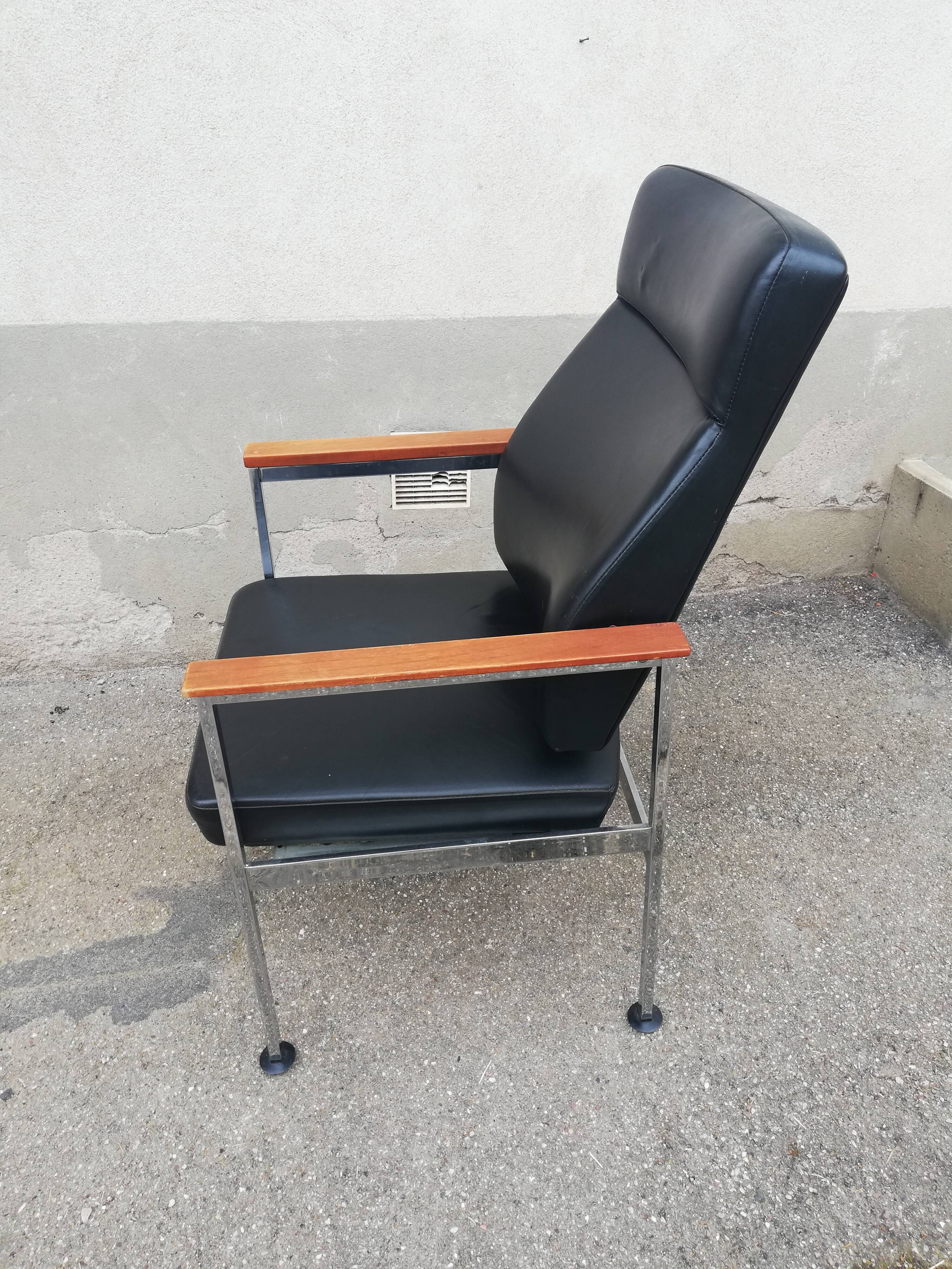 Vintage leather and teak armchair