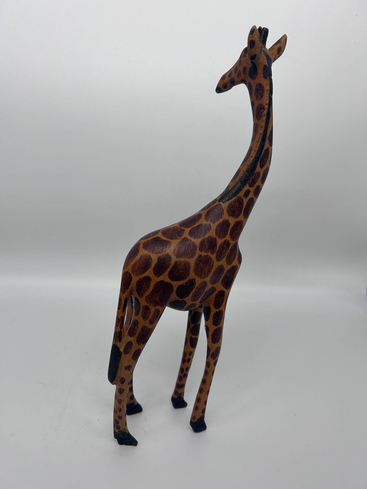 2 girafes en bois sculpté