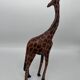2 girafes en bois sculpté