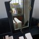 Art Deco leather and bronze mirror
