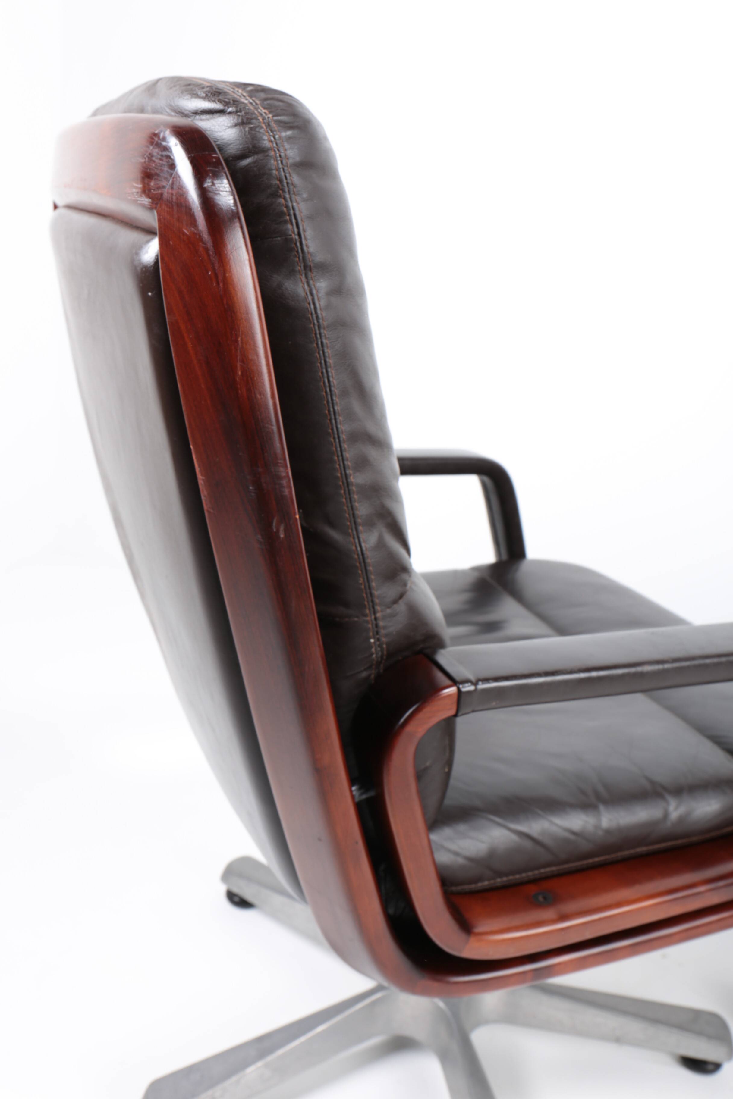 Pair of leather visitor armchairs by Eugen Schmidt