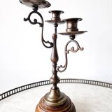 Pair of antique wooden and brass candlesticks