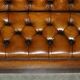 Pair of Victorian Chesterfield pub benches in leather.