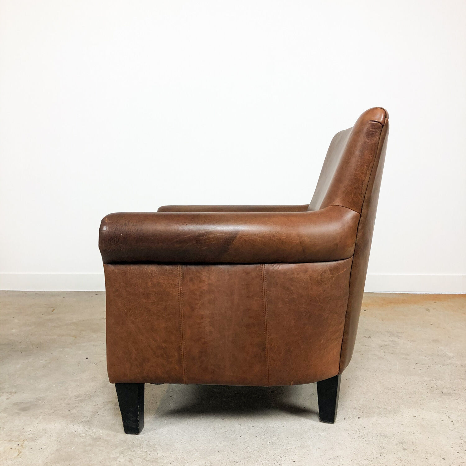 Set of two vintage leather armchairs