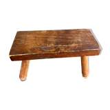 Low wooden stool