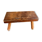 Low wooden stool