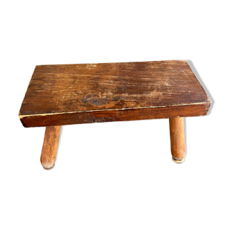 Low wooden stool