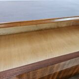 1950s chest of drawers covered in walnut with brass handles
